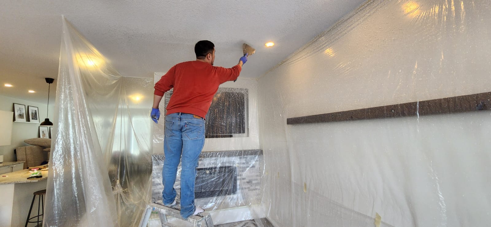 Popcorn ceiling removal to knockdown texture conversion in Calgary